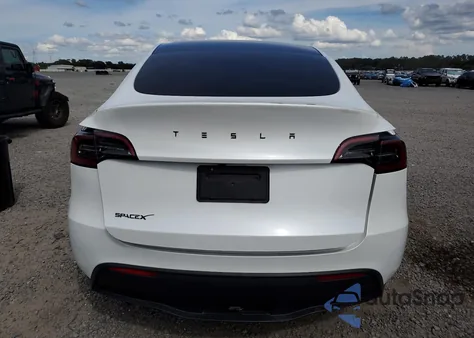 2024 Tesla Model Y from USA, damaged, VIN 7SAYGDED8RA334860